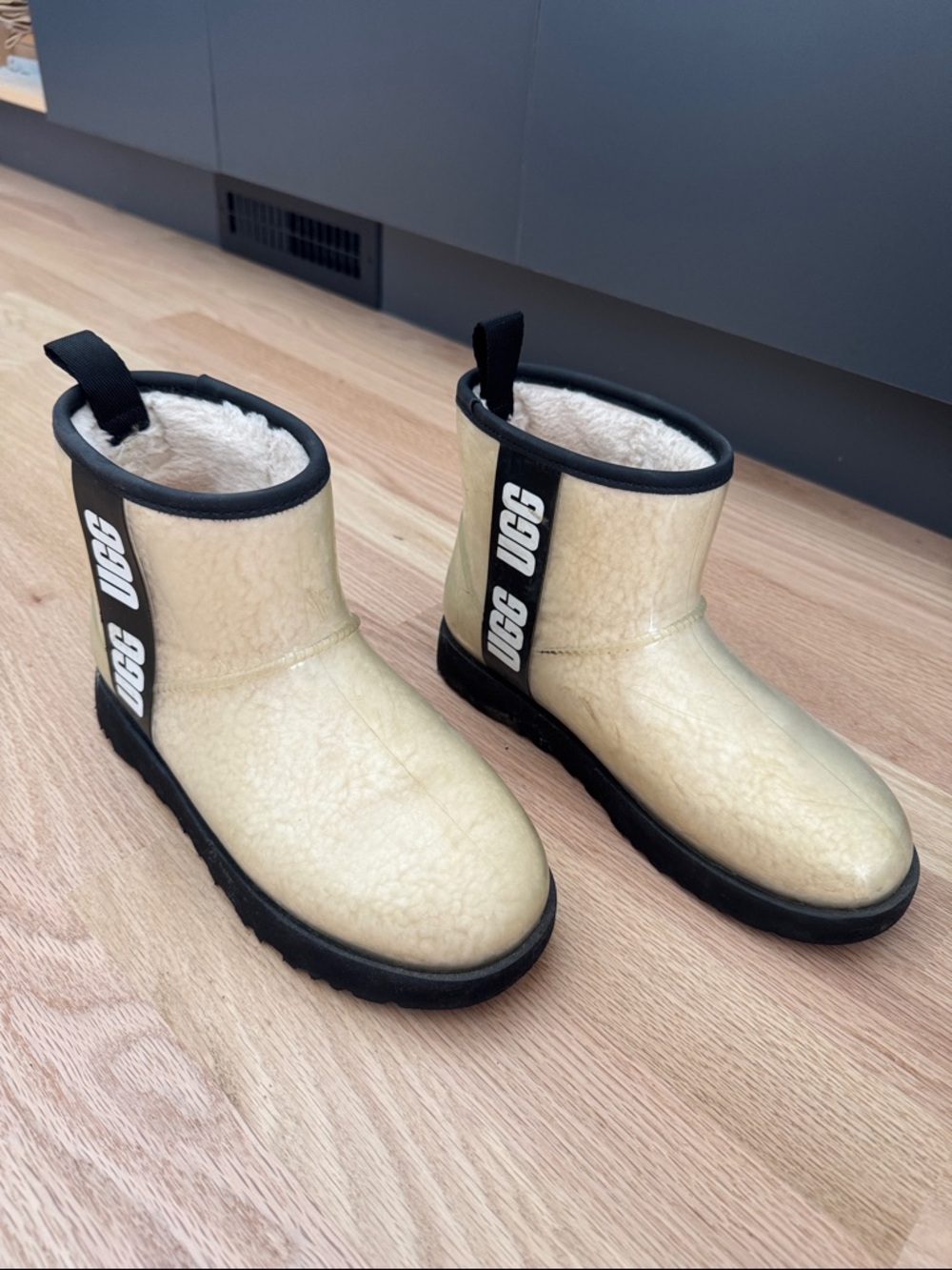 UGG Cream Shearling Ankle Boots with Black Accents